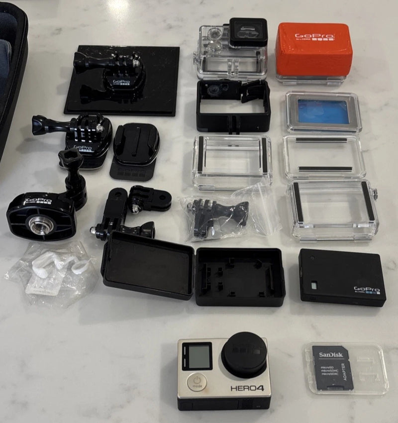 GoPro HERO4 Silver action camera kit with waterproof housings and SD card