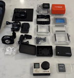 GoPro Hero 4 Silver Camera, 128GB SD card, extra clip on battery + accessories