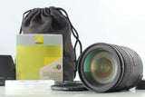 Nikon AF-S 28-300mm zoom lens with front glass element and textured barrel