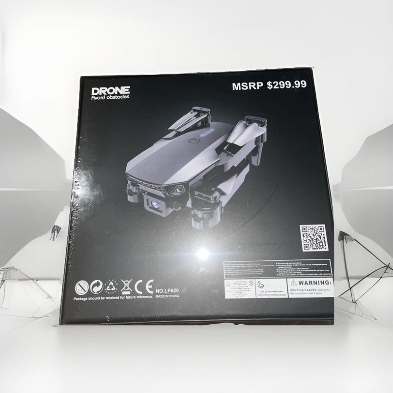 Sealed drone product box with drone graphic and barcode label