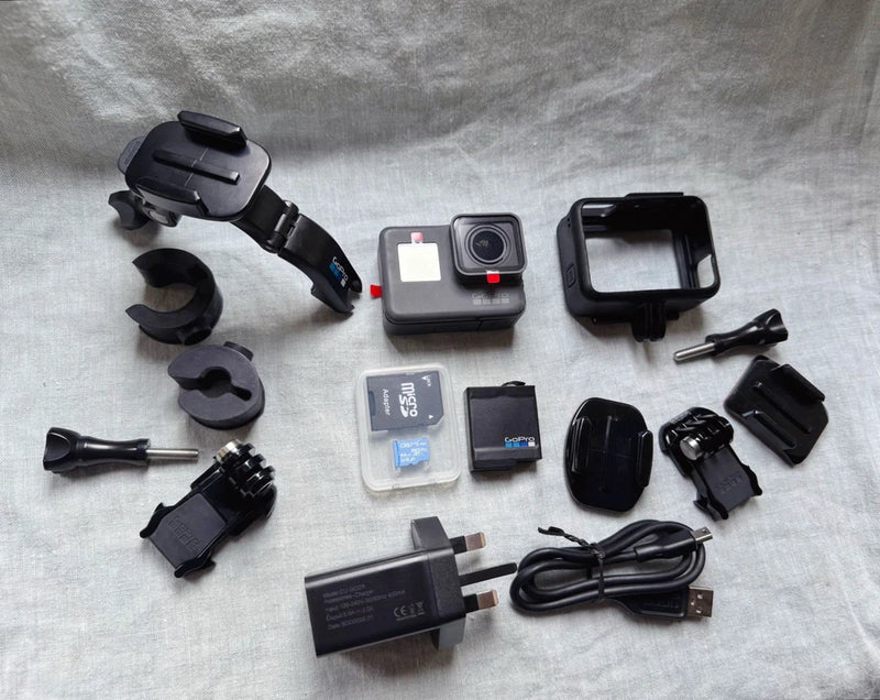 GoPro Hero6 Black action camera with touch screen and multiple mounting accessories