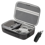 Portable hard-shell drone travel bag case, open with foam padding and cable compartment