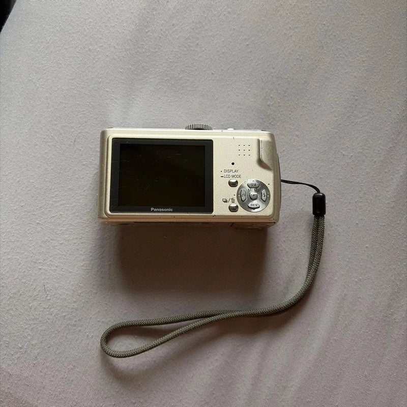 Panasonic LUMIX DMC-TZ1 Compact Digital Camera with Battery Charger and SD Card