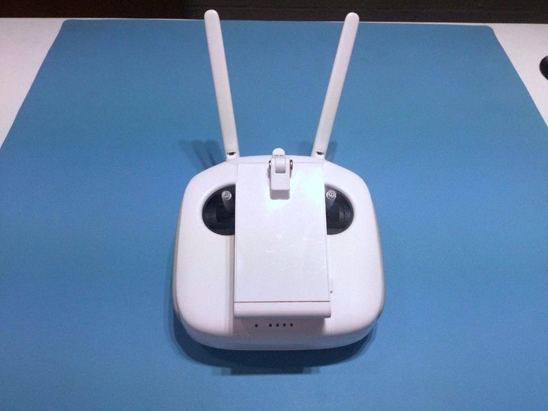 White DJI Phantom 4 Pro remote controller with two antennas