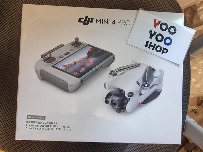 DJI Mini 4 Pro drone kit in retail box, showing controller and drone