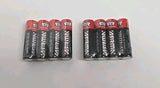 AA alkaline batteries, two packs of four, in sealed packaging