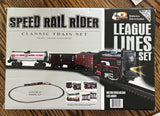 Battery-powered model train set in retail box with locomotive, 3 cars, and track