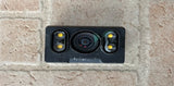 Rectangular FPV camera module with central lens and two built-in LED lights.