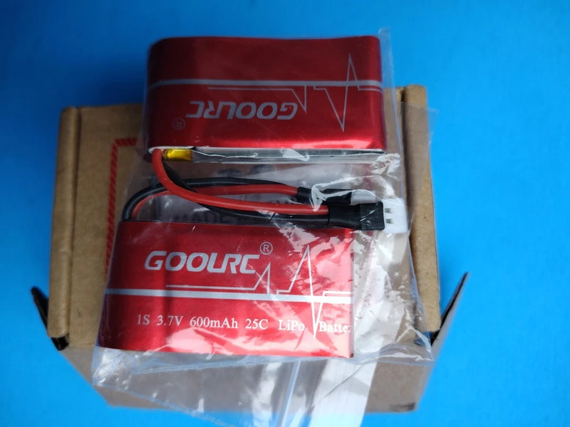 Red 1S LiPo battery pack with black connector and leads, in protective wrap
