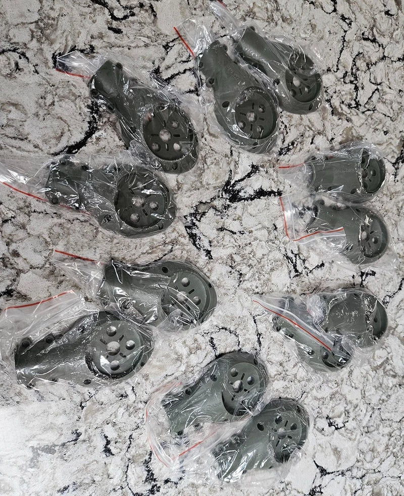 Set of 8 drone half motor mounts in clear sealed bags, dark gray metal