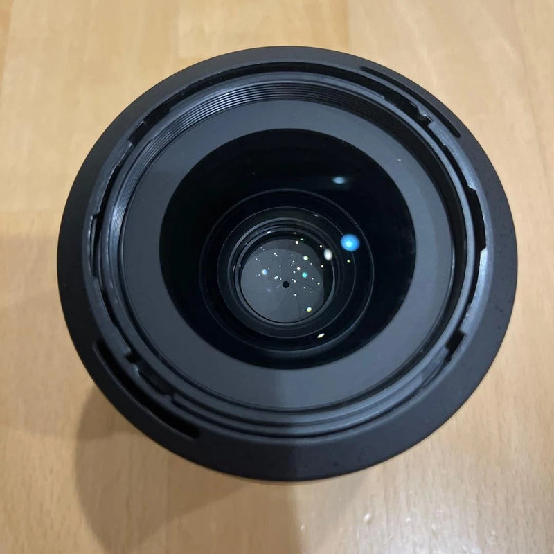 Nikon AF-S NIKKOR 35mm f/1.8G camera lens, black front element and focus ring