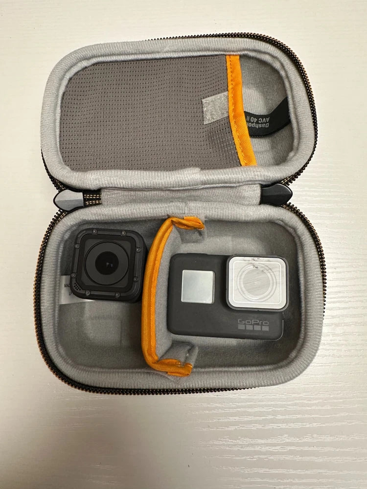 Action camera hard case with two cameras, lenses visible, orange trim and gray padding