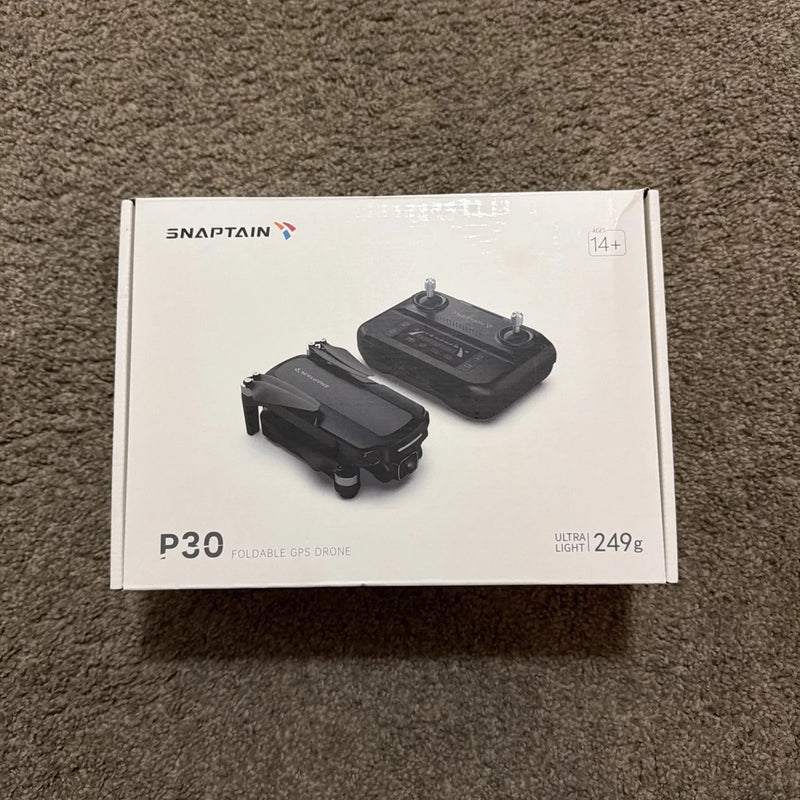 Foldable GPS drone box showing black P30 drone and controller, Ultra light 249g
