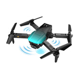 Mini quadcopter drone with front camera and four foldable propellers