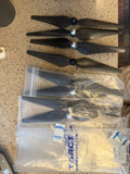 Carbon fiber drone rotor blades set in clear plastic bags, 8 blades