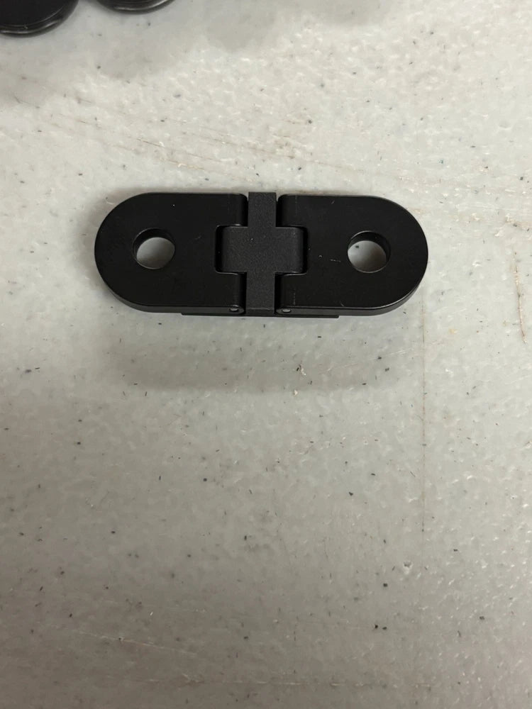 Black replacement finger clamp piece with two mounting holes