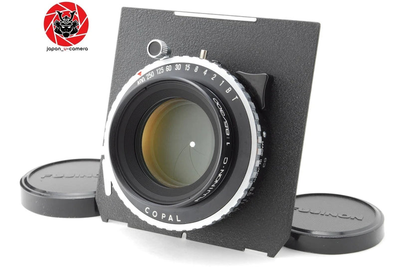 Vintage camera lens with Copal shutter, mounted in black case with caps