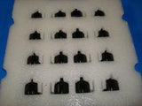 Black RC drone brushless motors with mounting hardware, shown in foam tray