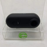 Black action camera with front lens and rear control button