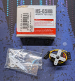 HS-65HB Mighty Feather RC gear servo with mounting brackets, cables, and parts