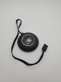 Round black GPS module antenna with compass symbol and attached cable with connector
