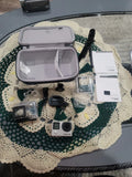 GoPro HERO4 silver action camera with accessories in a hard case and cables