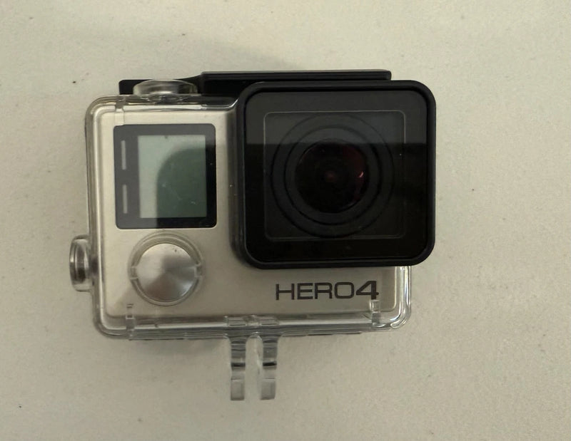 GoPro HERO4 action camera in clear waterproof case, black front lens and LCD screen