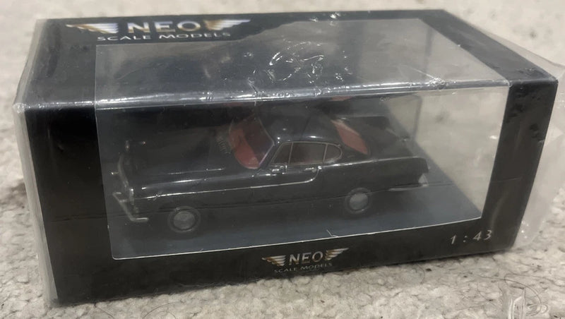 Grey metallic classic car model in clear display box, scale 1:43