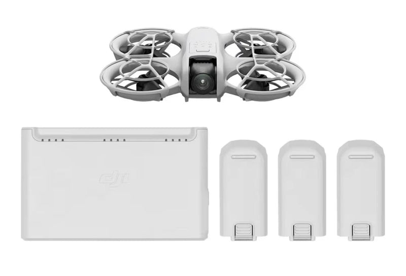 Foldable quadcopter drone with camera and three gray batteries in charging case