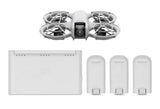 Foldable quadcopter drone with camera and three gray batteries in charging case