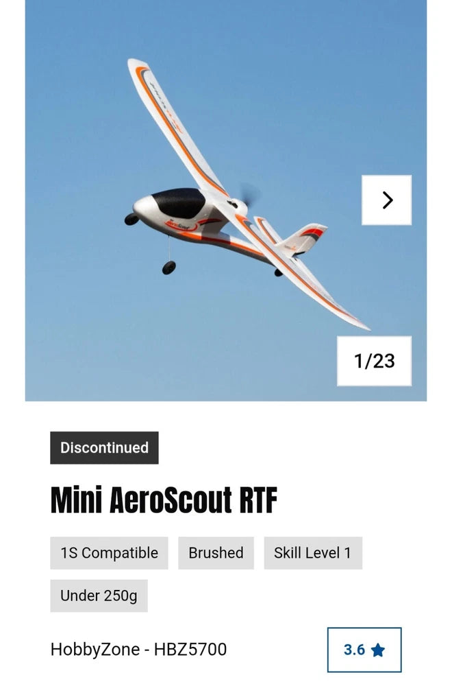 Mini RC airplane model with white, orange, and black fuselage and wings