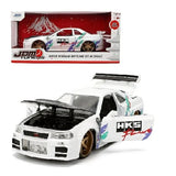 1/24 scale white Nissan Skyline GT-R R34 model car with open engine bay and decals
