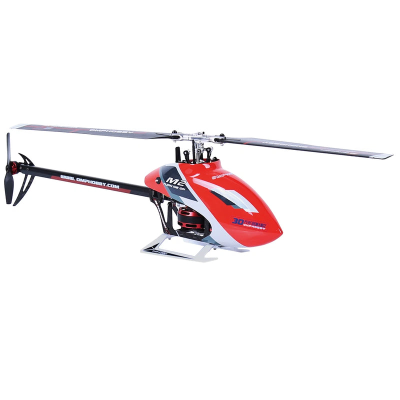 Red and white RC helicopter with skids, main rotor and tail boom, adult model