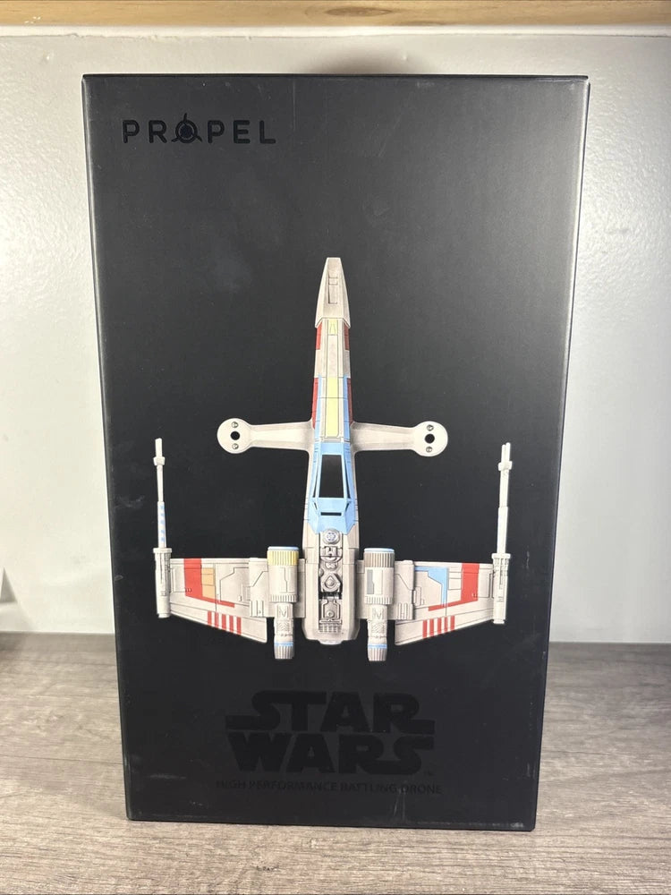 Propel Star Wars T-65 X-Wing quadcopter drone in sealed box, illustrated craft front view