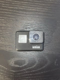 GoPro Hero 7 Black Edition action camera with front screen and circular lens