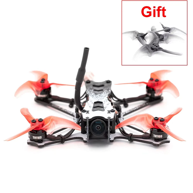 Freestyle FPV racing drone with orange props and front camera module
