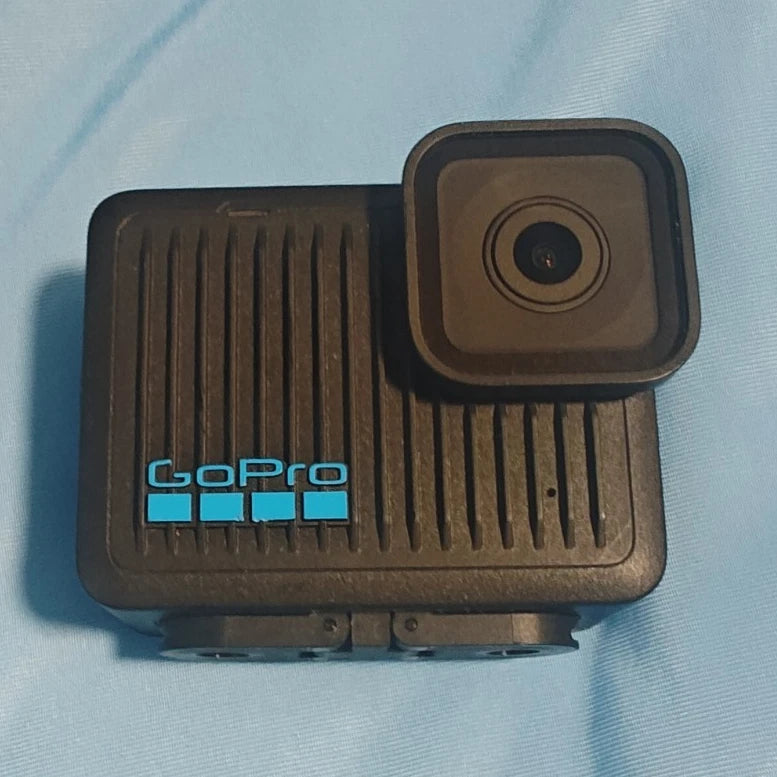 GoPro action camera in black with front lens and protective case