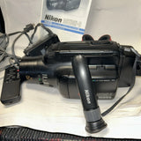 Nikon Action-8 VN-870 8mm video camcorder, black handheld unit with strap and lens