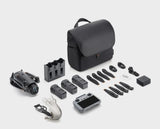 Camera drone accessories kit with black carrying case, batteries, propellers, remote controller