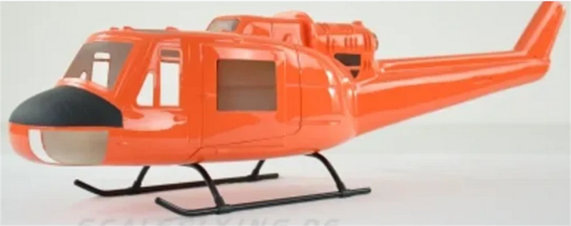 Orange RC helicopter fuselage with side cockpit and black landing skids.