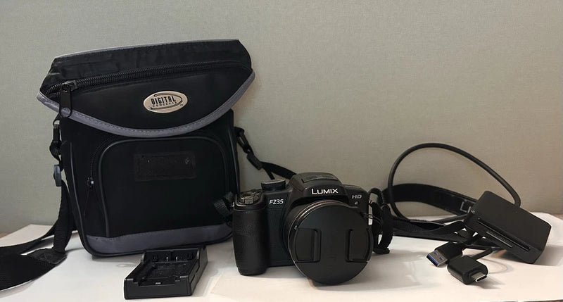 Panasonic Lumix DMC-FZ35 18x Optical Zoom 12.1 MP HD Video Camera + Accessories