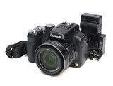 B+ Fair Panasonic LUMIX DMC-FZ200 Initial Defect Return Compatible 55-229