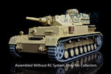 Tan metal static tank model with rotating turret and detailed tracks, no RC system.