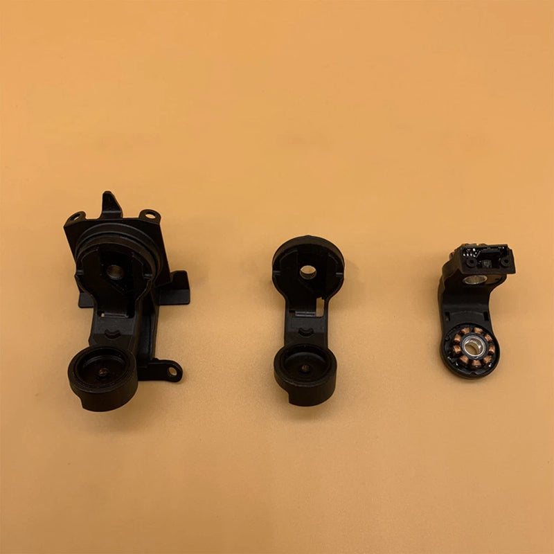 Black plastic motor bracket set with mounting holes and pivot cups