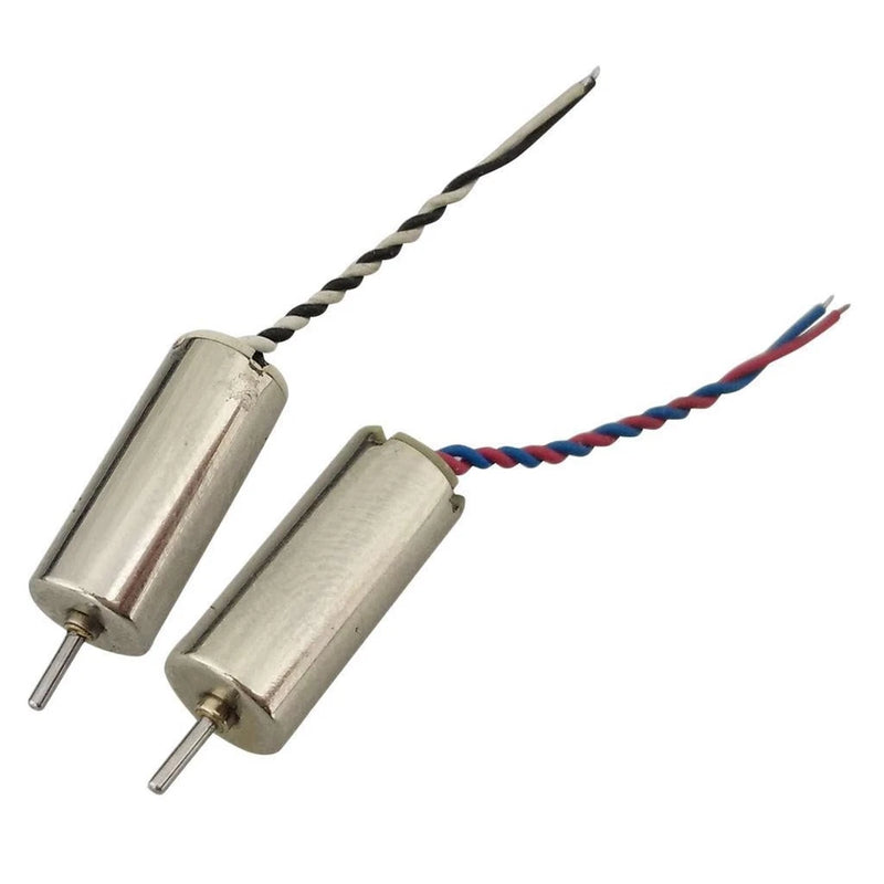 Pair of small silver RC drone motors with wire leads and connector pins