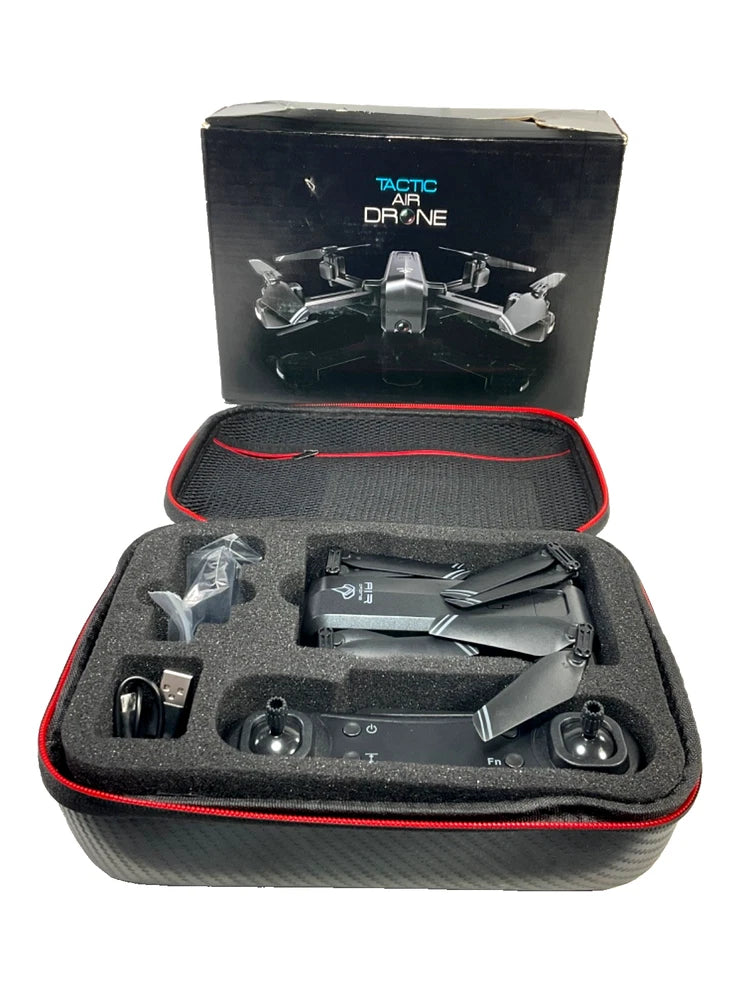 Folding quadcopter drone in hard case with foam insert and remote accessories