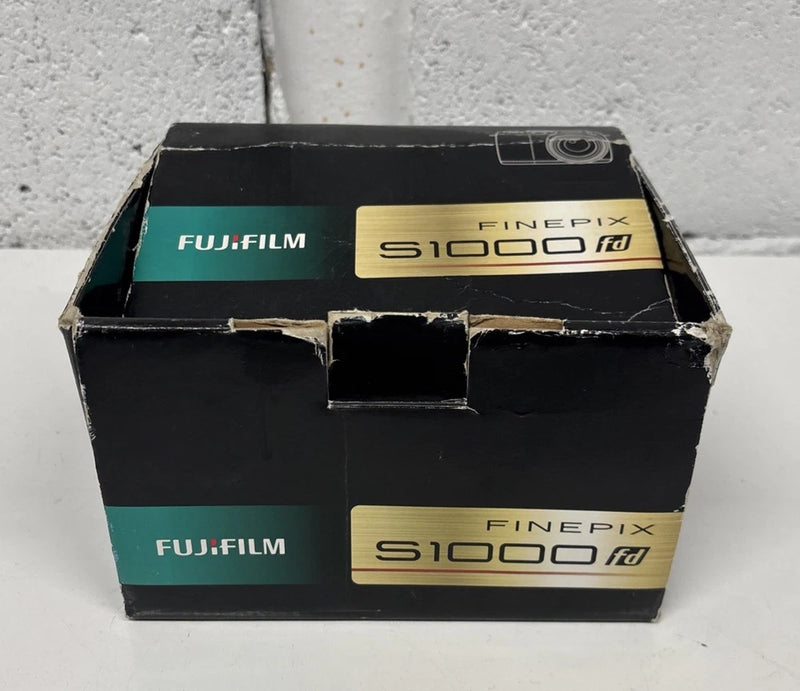 FujiFilm FinePix S1000fd bridge camera box, black with teal and gold labels
