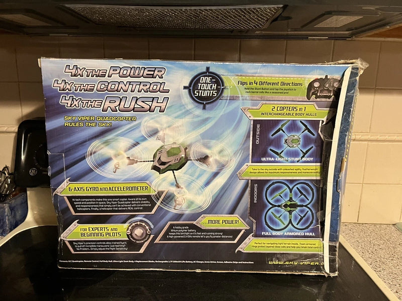 Drone control kit box with remote, featuring propeller graphic and flight modes