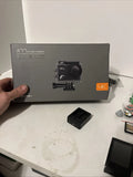 Action camera retail box with printed 4K camera and accessory icons