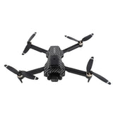 Quadcopter drone with four propellers, dark body and patterned top, front camera module